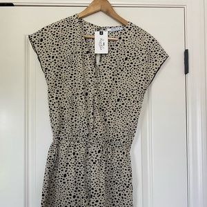 Size small romper leopard print. New with Tags